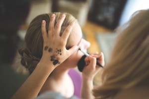 kaboompics.com_Make up artist applying make up to a woman